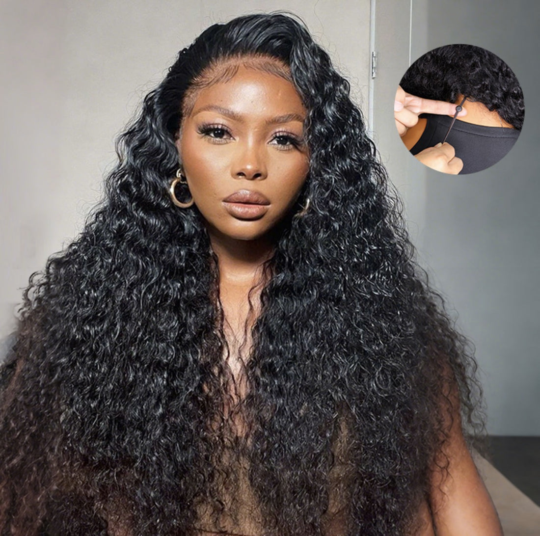 Woman with long, curly black hair wearing a wig, with a close-up inset showing the back of the wig.